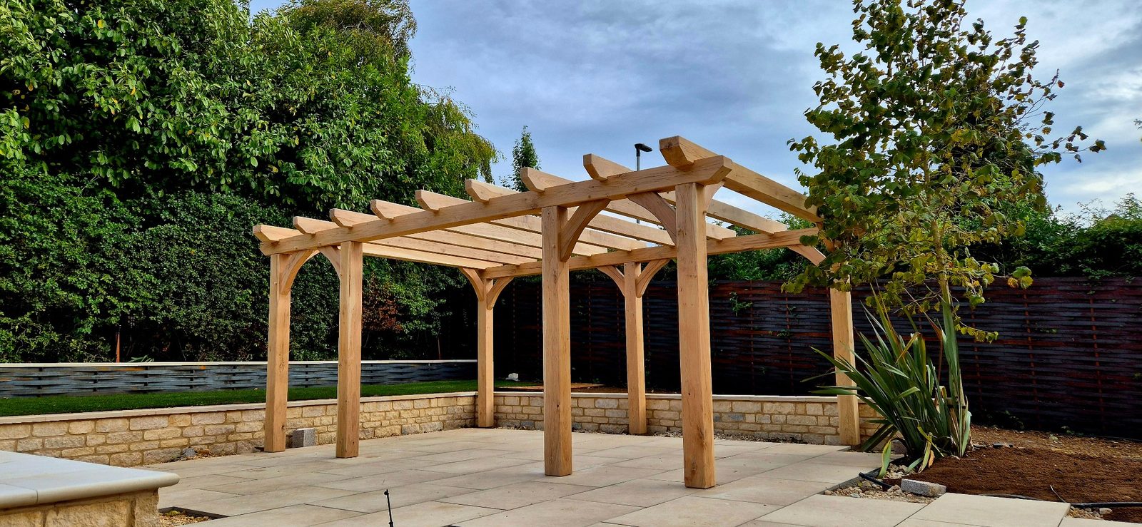 Oak pergola in a landscaped garden near Stamford